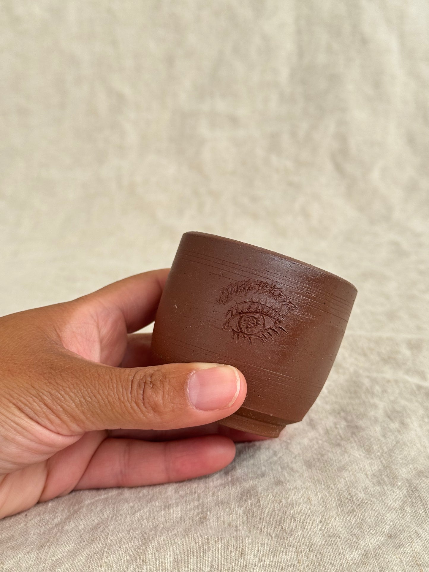 Small eye cup strike anywhere match holder