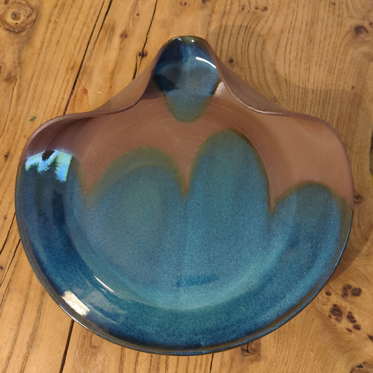 Red clay serving dish with blue glaze