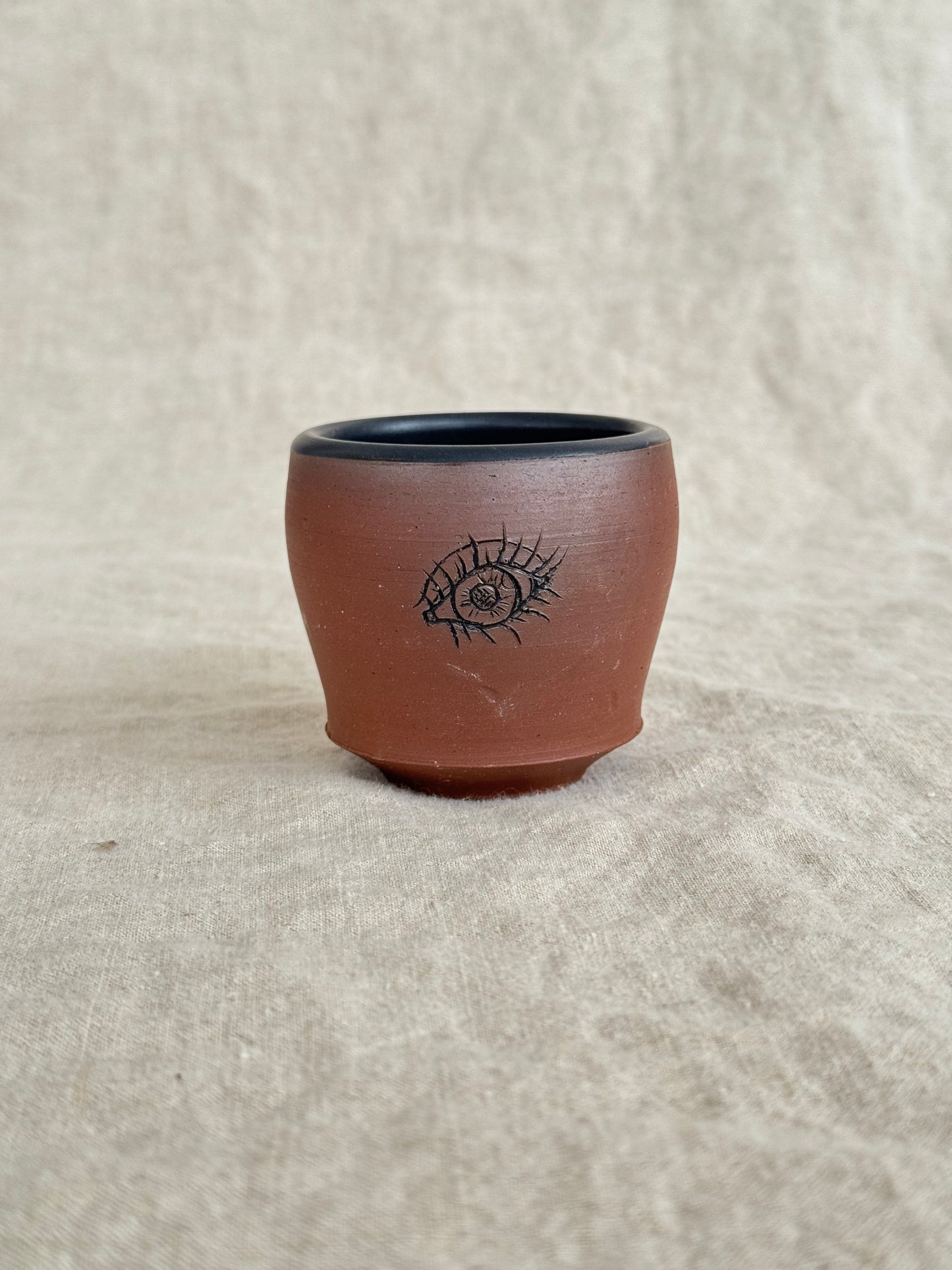 Small eye cup strike anywhere match holder