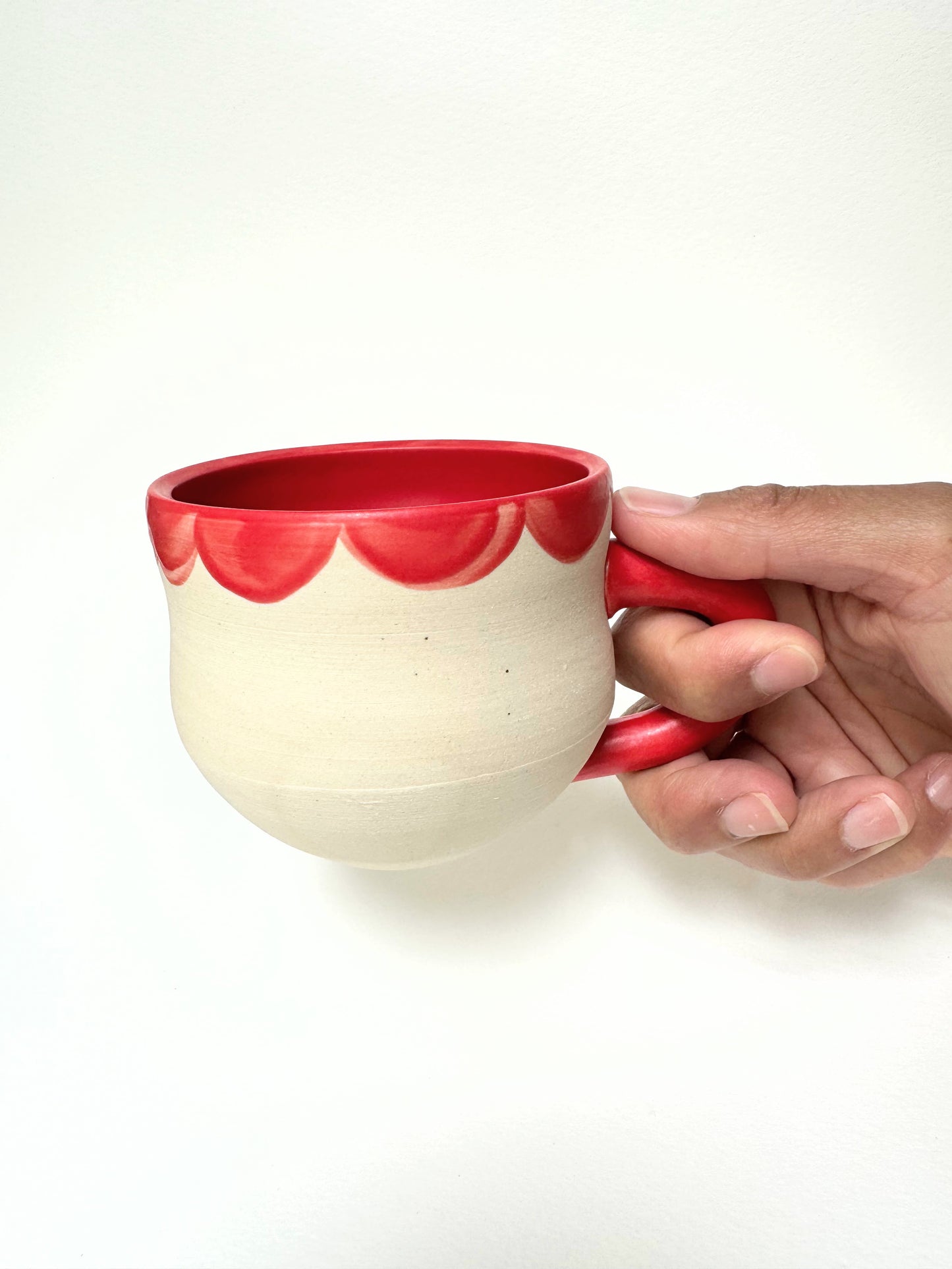 White mug with Neon Red Inside Handle and Petal Colar